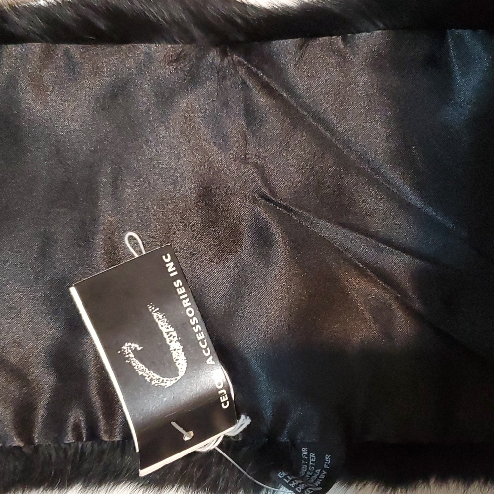 Rabbit fur and polyester lined scarf. Brand new never worn. All Black.